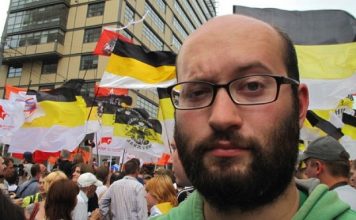 Anti-Kremlin Journalist Jailed by Moscow Court over One-Person Protest